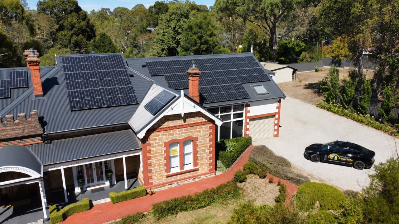 Aerial view of a heritage Adelaide home with rooftop solar panels